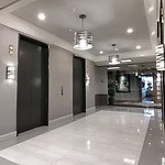 Richmond Plaza two-story granite lobby atrium — Class A office space Tulsa OK
